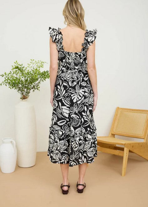Darling summer dress! This bold black and white floral dress is perfect for warm spring days and into the hot summer! It's lightweight for comfort, and it's lined as well.