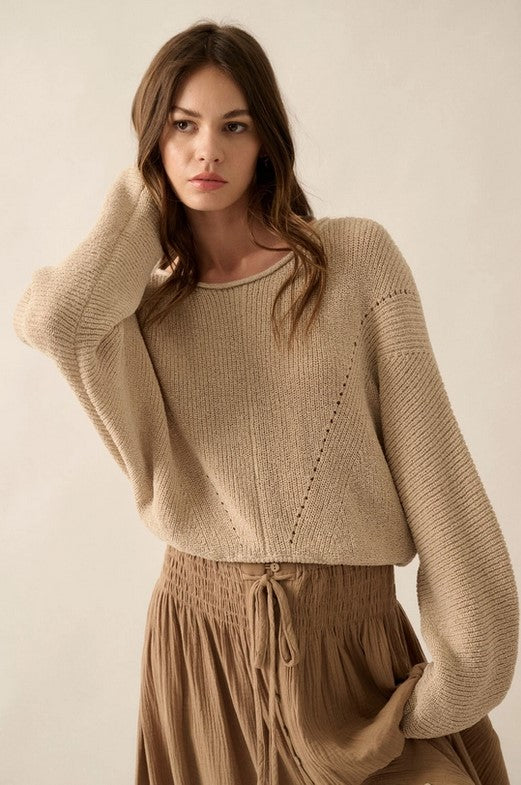 Front view of taupe sweater with extra long sleeves that feel so cozy! It's ribbed with pointelle knit and has a boat neckline and dolman sleeves.